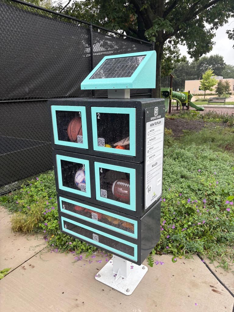 The kiosk stocked and ready on a rainy day